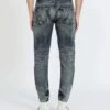 John Richmond Jeans Slim Con Lacerazioni Frontali E Logo "RICH" Iconico Sul Retro
