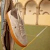 Sneakers In Pelle Con Bande Laterali E Borchiette